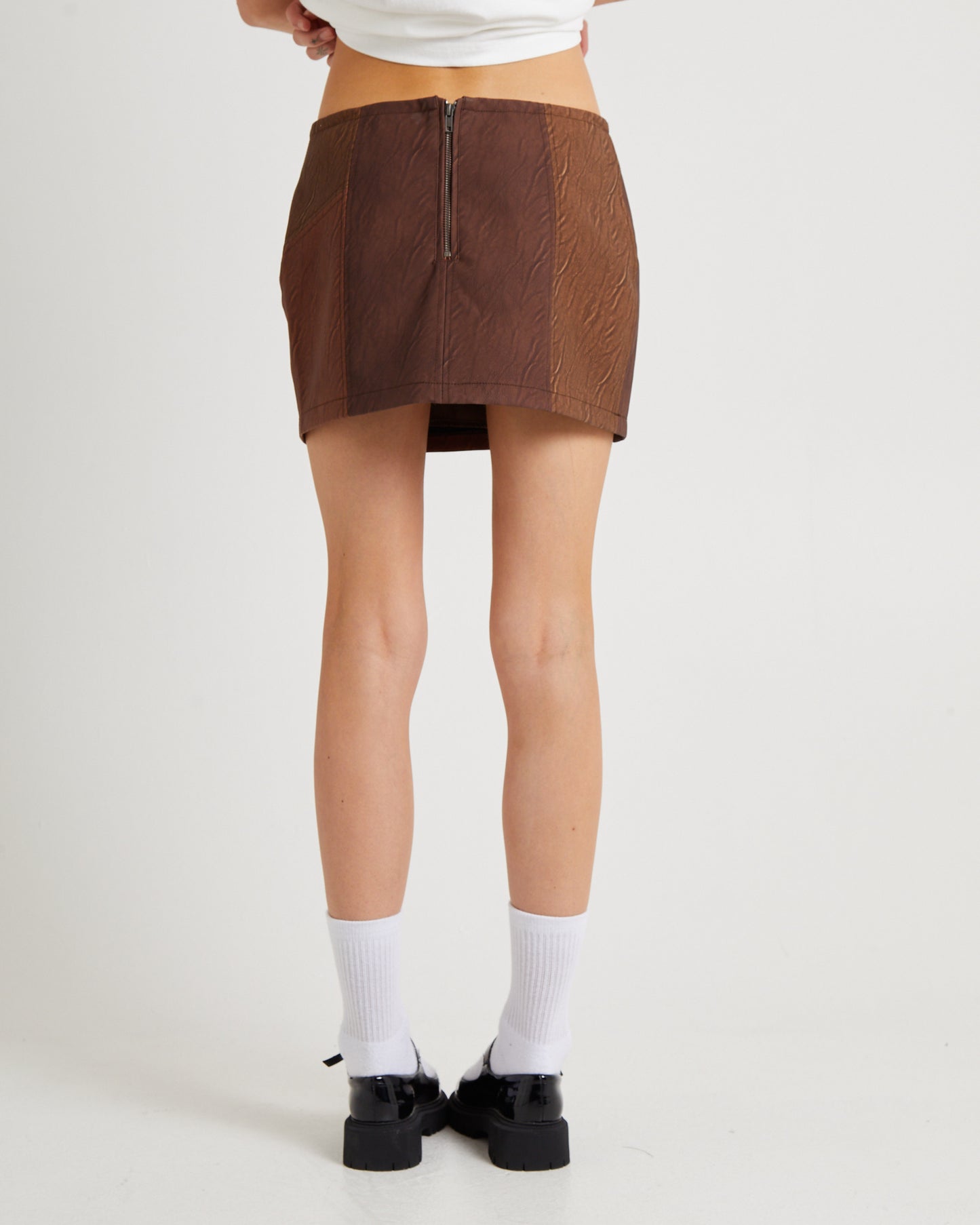 Splice PU Distressed Mini Skirt