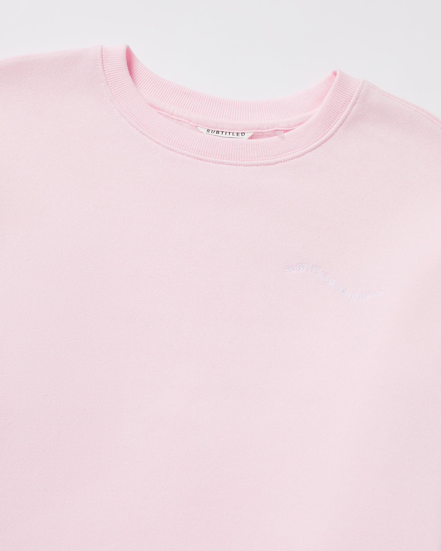 Teen Girls Oversized Wave Origin Fleece Crew Neck Jumper in Pink