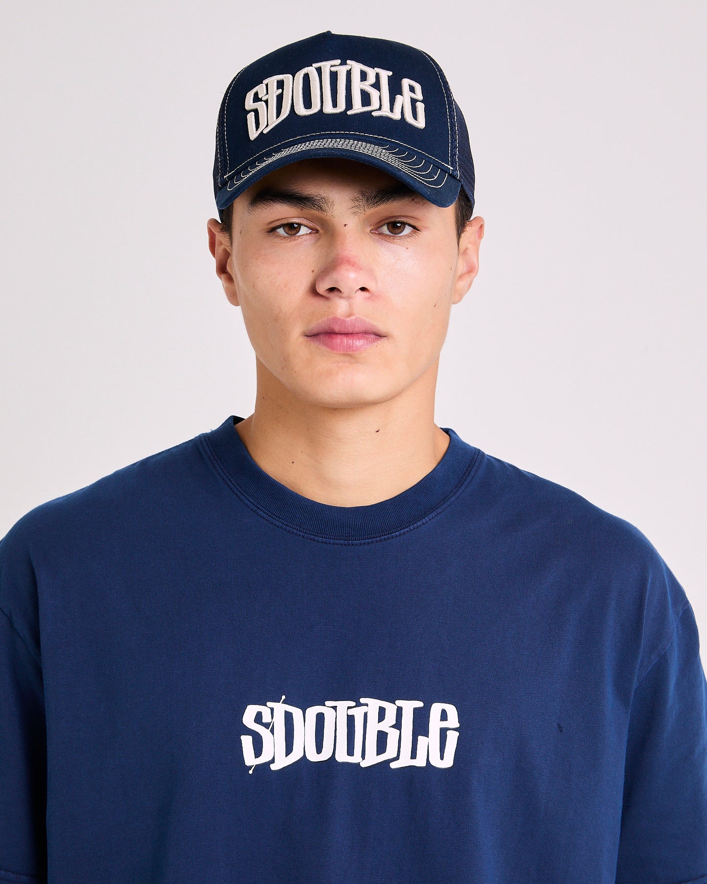 Mid-Block Curved Peak Trucker Cap