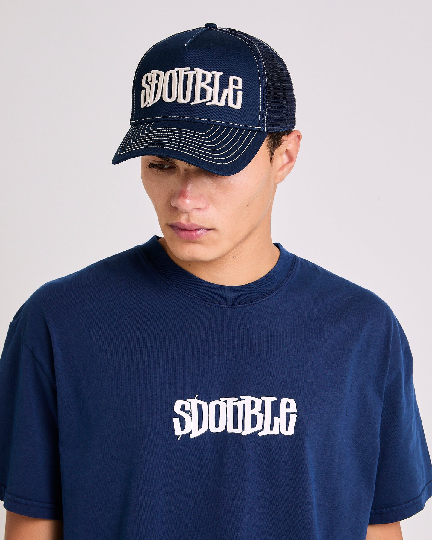 Mid-Block Curved Peak Trucker Cap