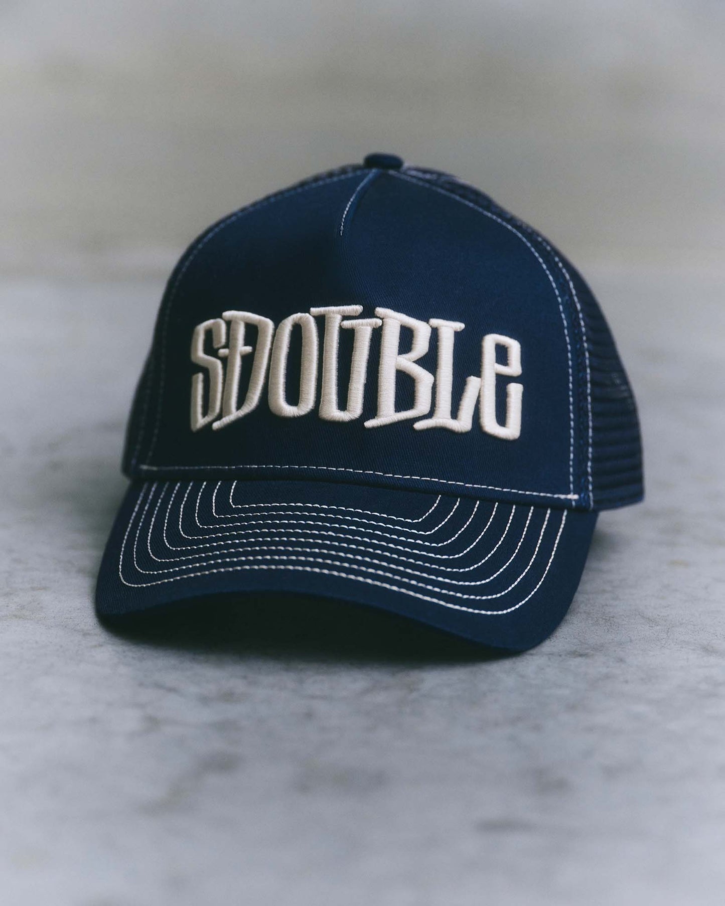Mid-Block Curved Peak Trucker Cap