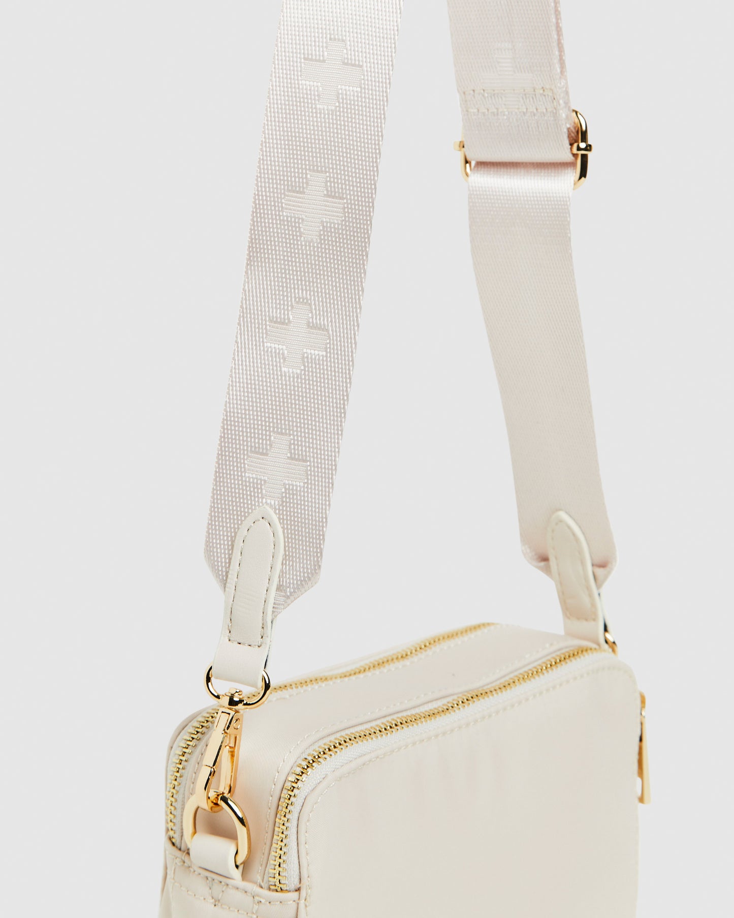 Laroi Cross Body Bag in Bisque Nylon Gold