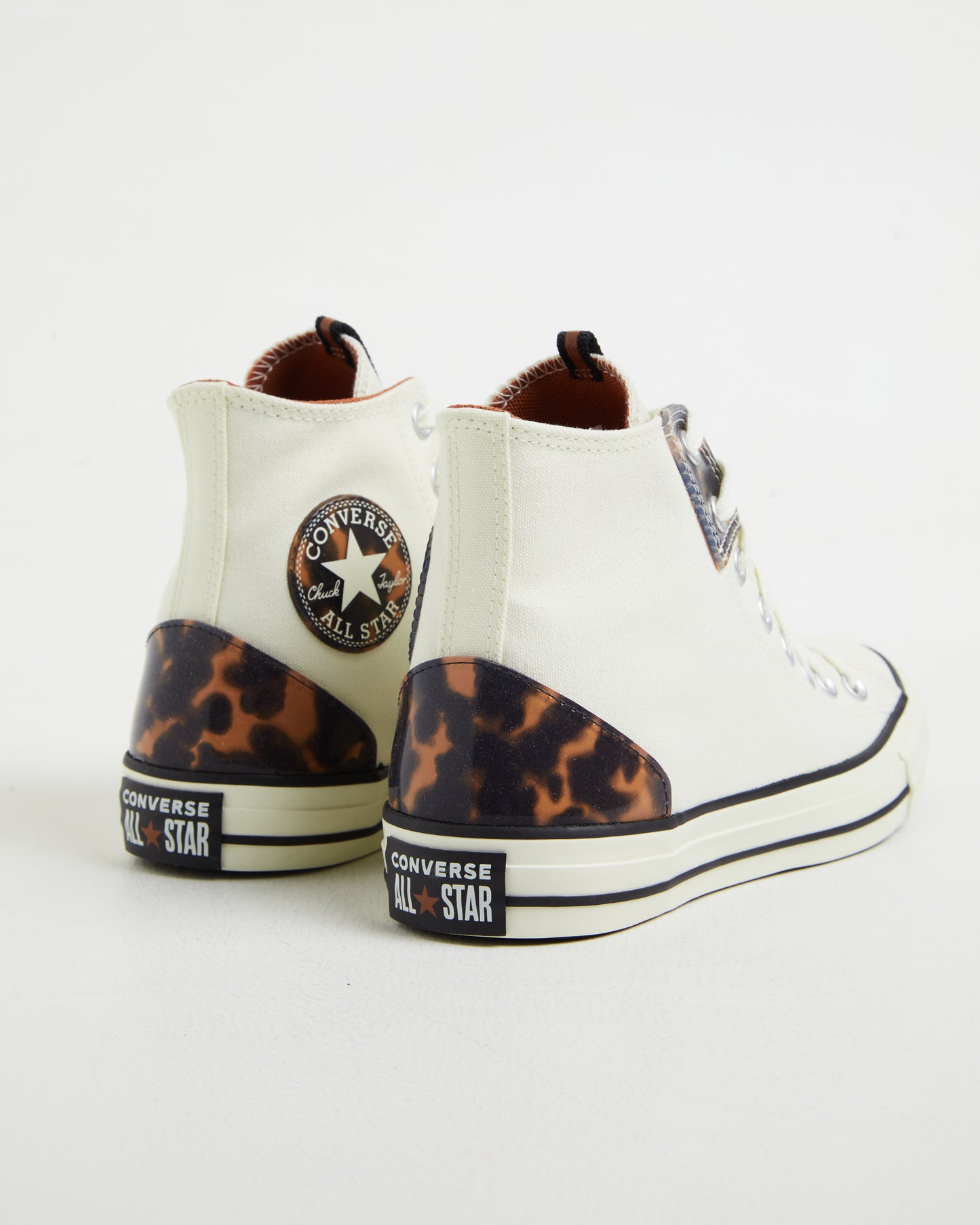 Chuck Taylor All Star Hi Top Sneakers in Tortoise White