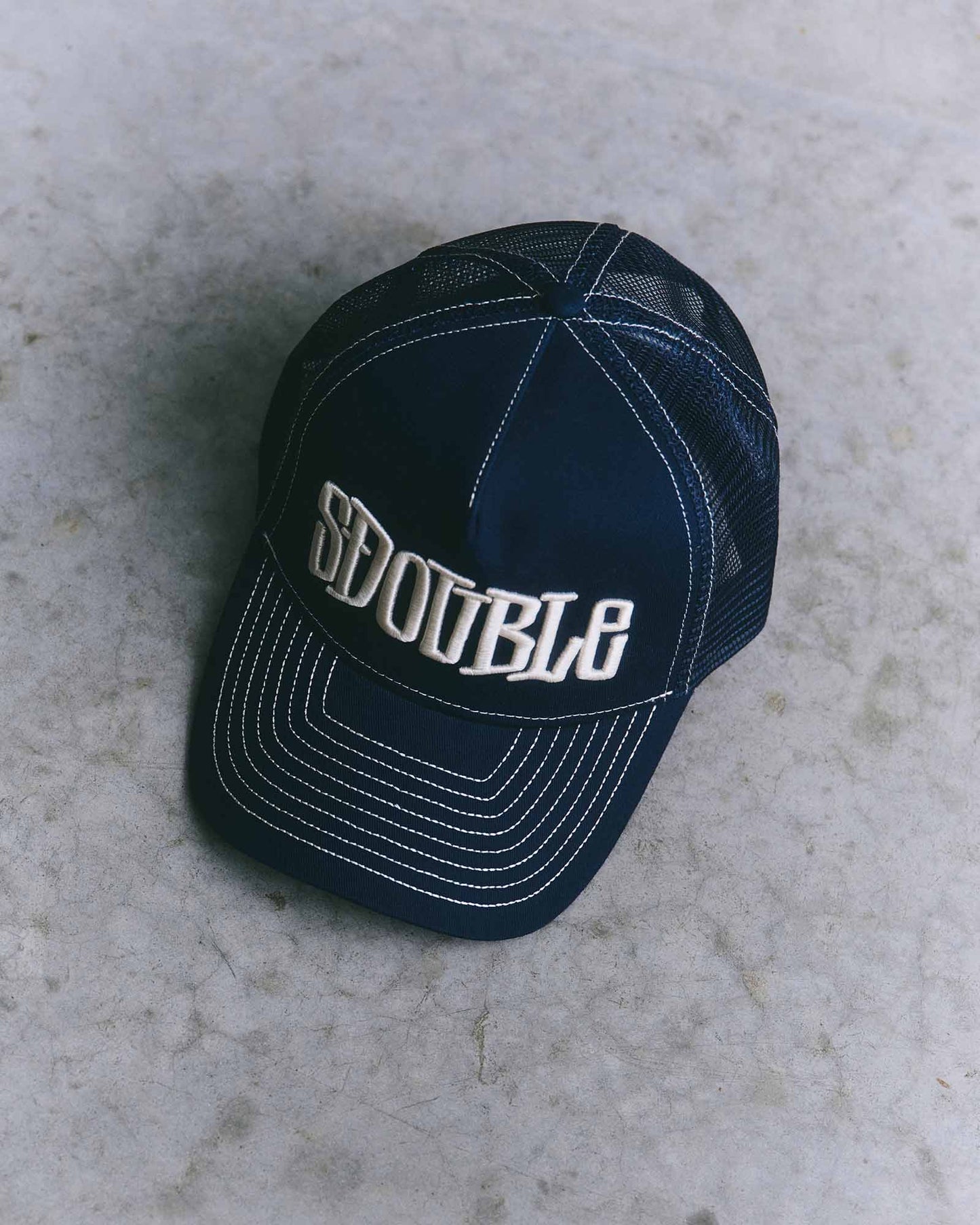 Mid-Block Curved Peak Trucker Cap