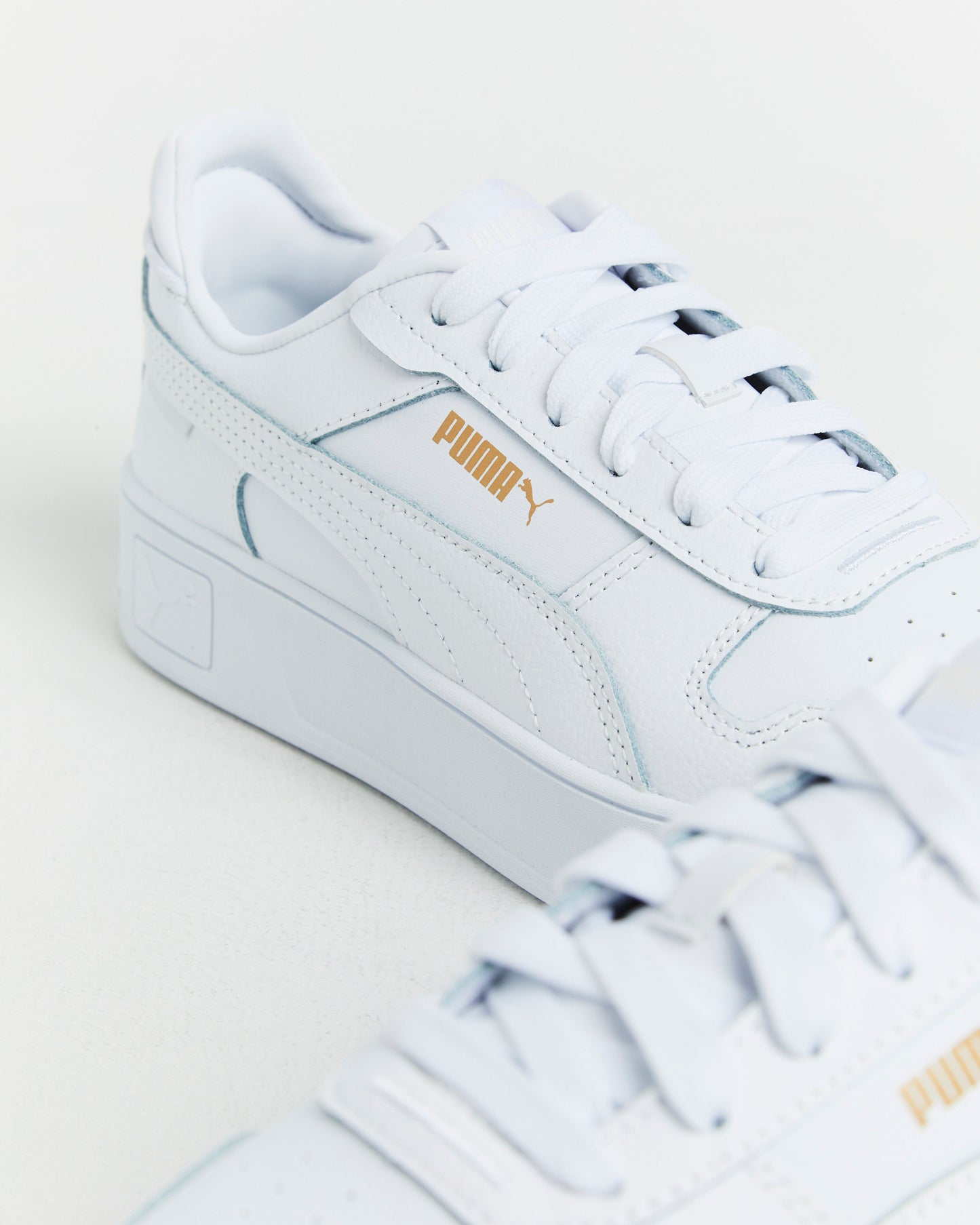Carina Street Puma Sneakers in White/Gold