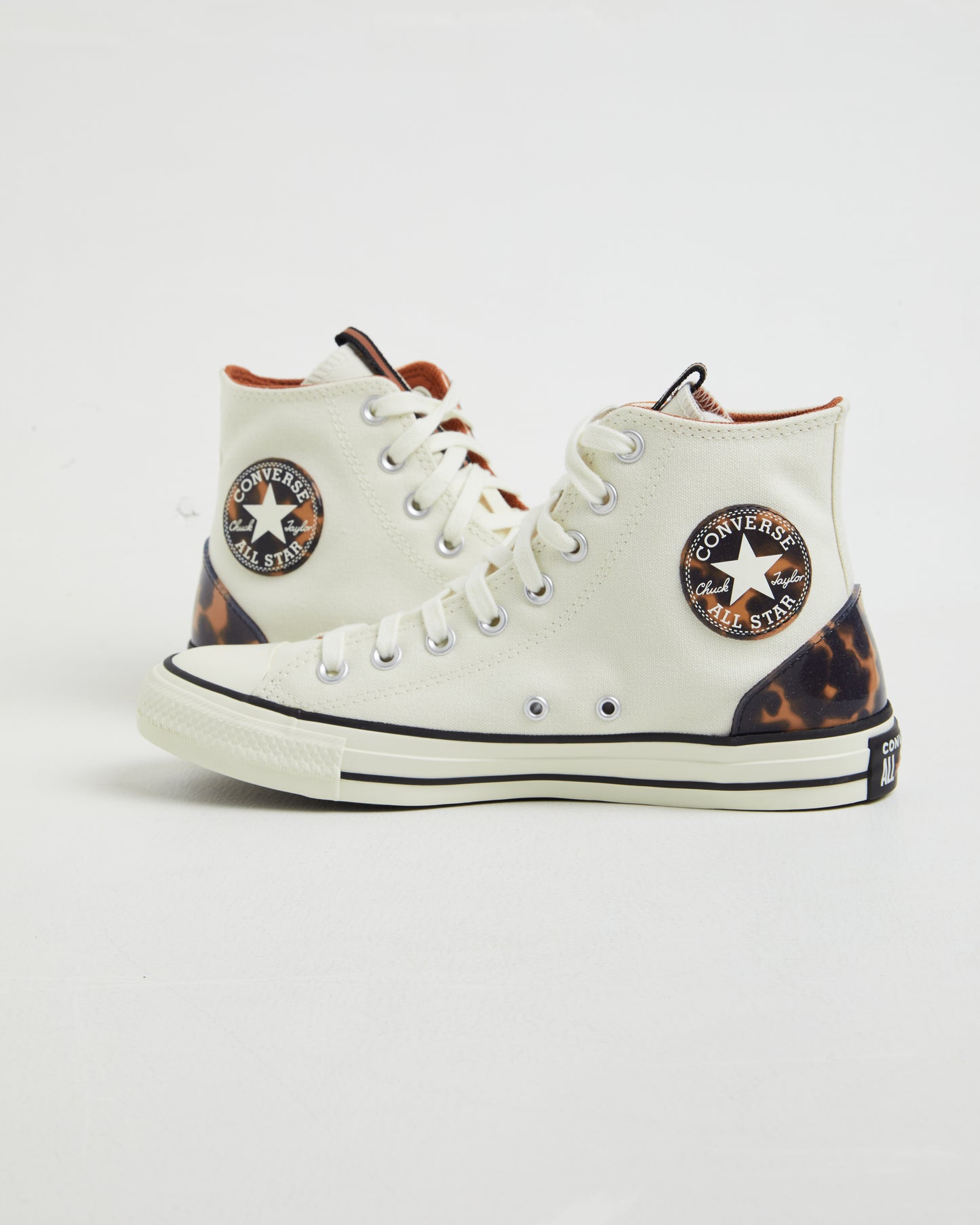 Chuck Taylor All Star Hi Top Sneakers in Tortoise White