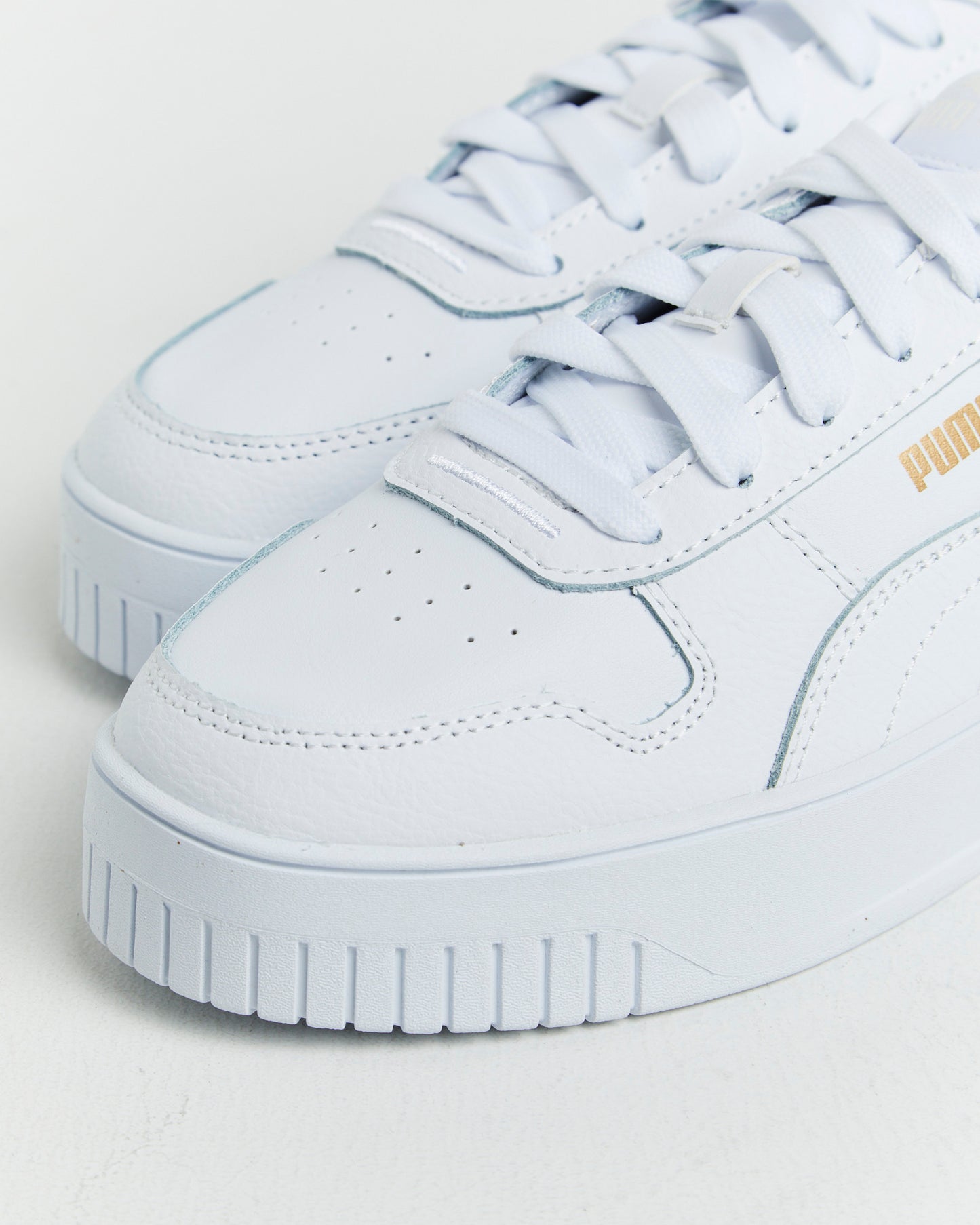 Carina Street Puma Sneakers in White/Gold