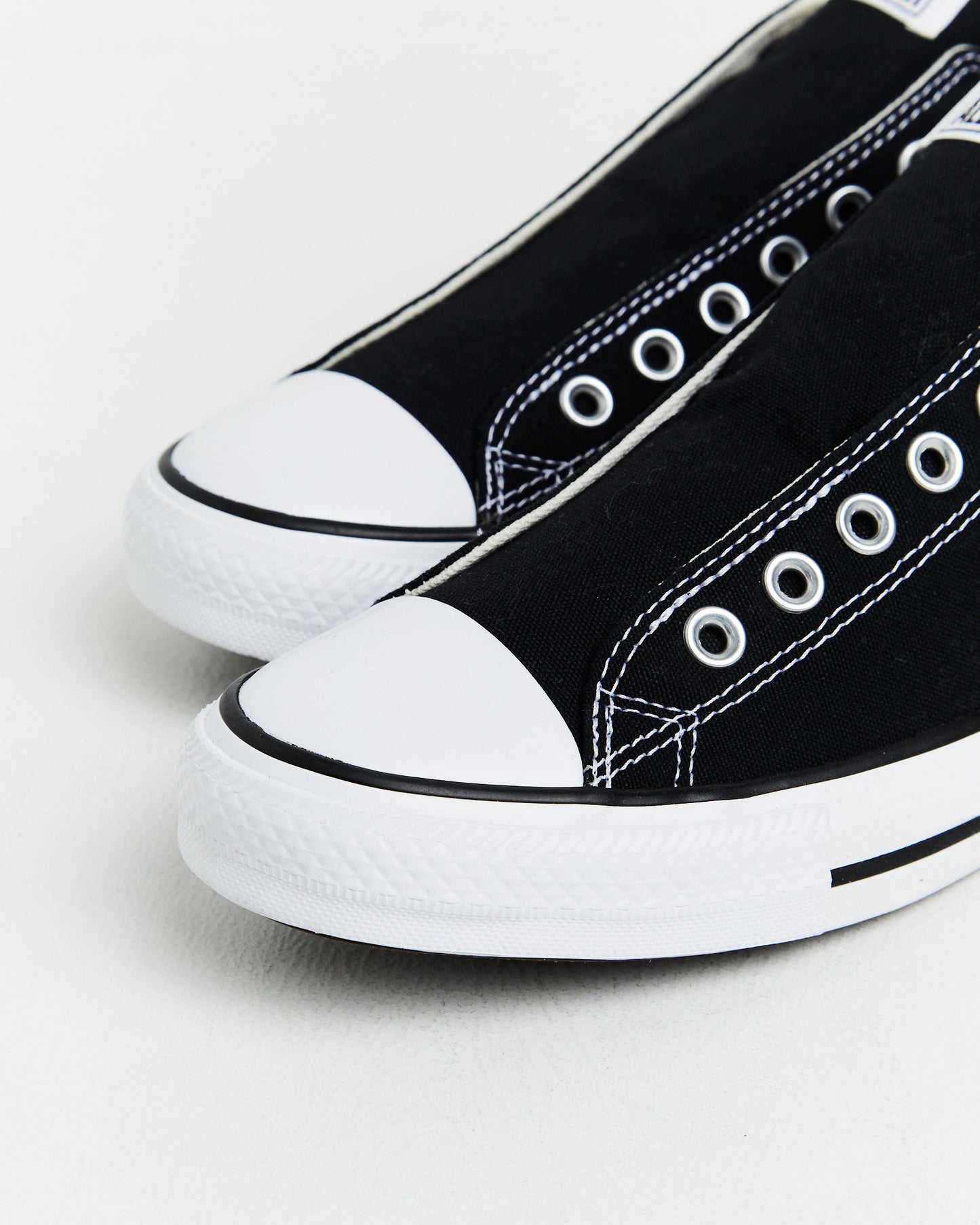 Chuck Taylor All Star Slip On Sneakers In Black/White