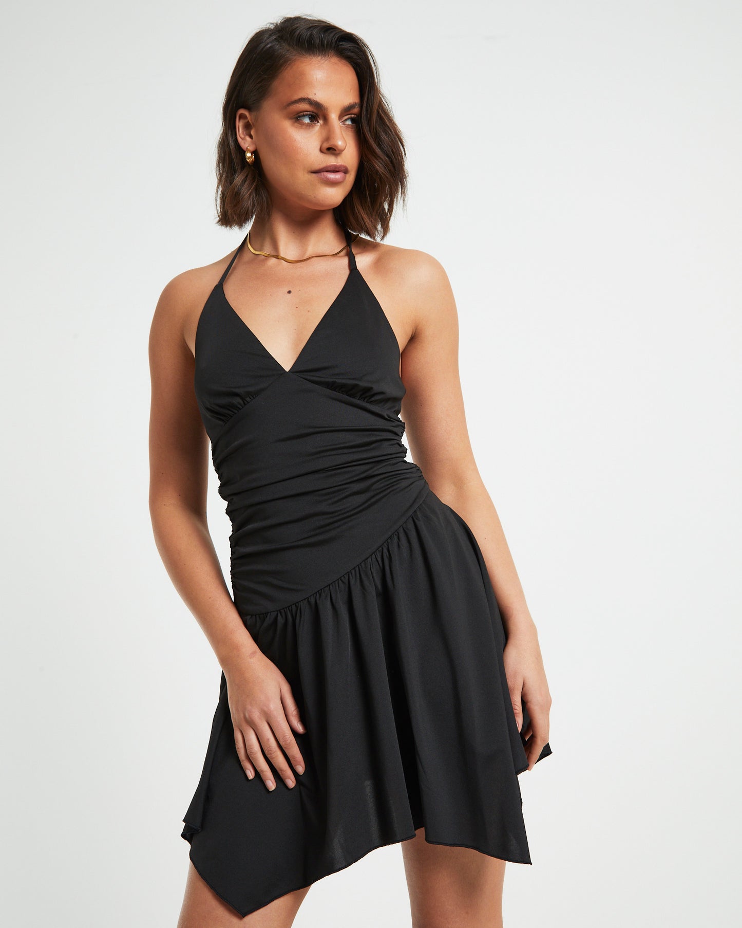 Sawyer Asymetric Hem Halter Mini Dress in Black